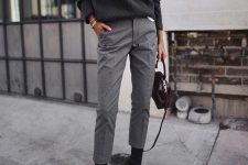 a monochromatic winter work look with a graphite grey turtleneck sweater, grey cropped pants, black sock boots and a burgundy bag