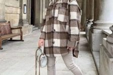 a neutral winter look with a tan hoodie, grey leather leggings, matching boots, a grey bag and a plaid shirt jacket