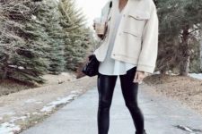 a pretty winter look with a white jumper, black leather leggings, black combat boots, a creamy shirtjacket and a black bag