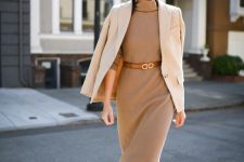 a tan midi sweater dress, a creamy blazer, a brown belt and brown shoes for a very laconic and stylish work look