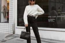 a white ribbed sweater, layered necklines, black high waisted jeans, black shoes and a bag for work