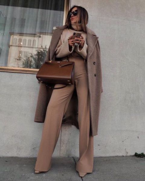 an elegant caramel toned work look with a tan sweater, beige trousers, a taupe coat and a brown leather bag is chic