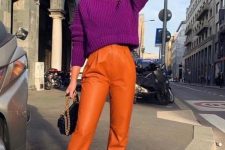 an extra bold look with a fuchsia cropped swetaer, orange leather trousers, hot pink shoes and a black bag