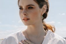 jaw-dropping white and green gemstone statement earrings and a matching ring – wear these pieces with chic and bold looks