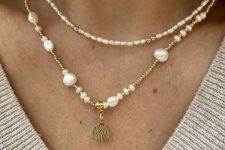 layered necklaces –  a seed pearl one with gold beads and a regular and irregular pearl one with a coin for a trendy look
