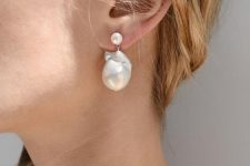 stunning huge baroque pearls are set with single white pearl studs will make a fantastic statement in your outfit