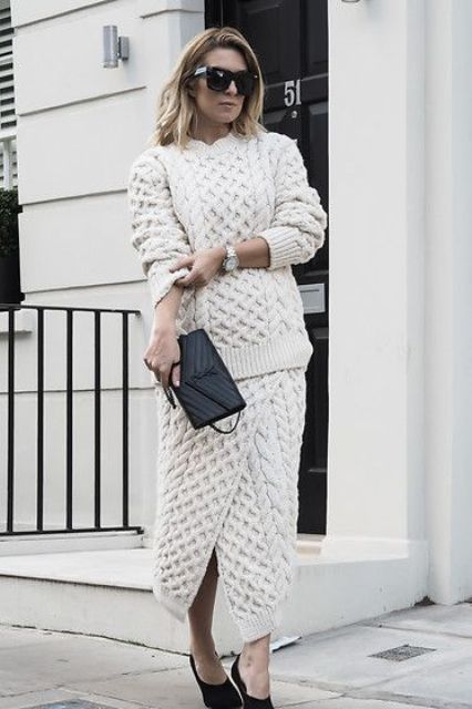 a beautiful creamy knit co-ord set with a pretty pattern, black heels and a black clutch for winter