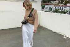 02 a beige chunky sweater, a white slip midi skirt, white cowboy boots and a brown bag for a simple and stylish work look