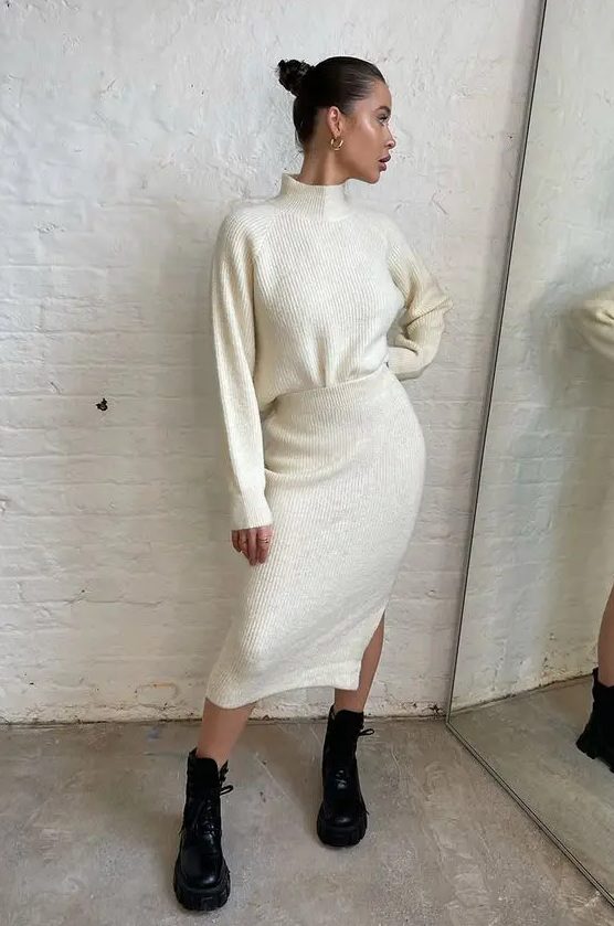 a fresh winter look with a creamy knit suit - a turtleneck and a midi skirt with a slit plus black combat boots