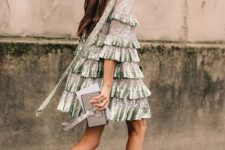 11 a silver tiered mini dress with light green sequin ruffles, seafoam shoes and a neutral clutch for the holidays