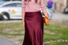 12 a burgundy slip skirt, a pink top, a brown clutch and two tone shoes for a spring or fall look