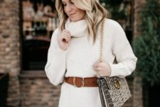 13 a delicate neutral mini sweater dress with a brown belt, a snakeskin print bag on chain for a lovely holiday look