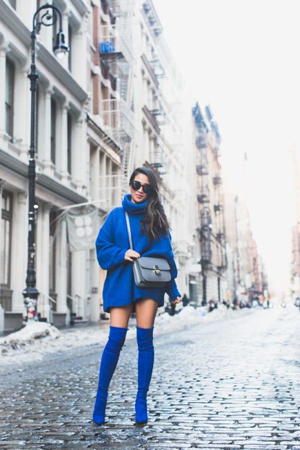 an electric blue sweater mini dress, matching velvet over the knee boots and a grey bag to stand out