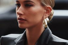28 a low bun with a super sleek top paired with statement earrings is a timeless and very refined idea for any party