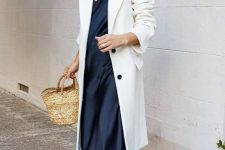 28 a navy slip midi dress, a white trench, white sneakers and a straw bag for a spring work outfit
