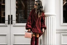 29 an oversized chunky knit mini sweater dress, burgundy over the knee boots and a blush mini bag