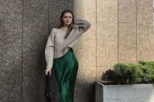 30 a sophisticated fall work outfit with a neutral sweater, an emerald slip midi, nude shoes and a black bag