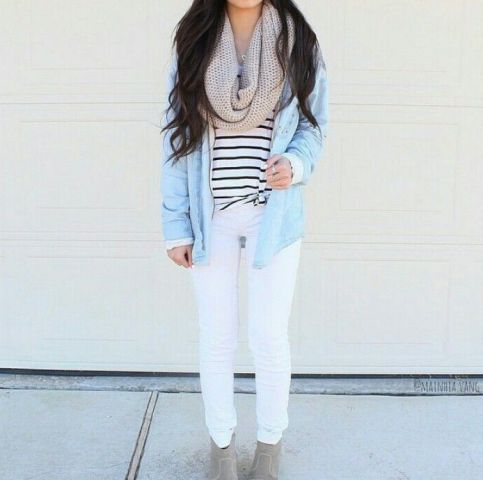 With black and white striped loose shirt, light blue loose jacket, white pants and gray suede boots