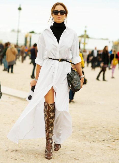 With black belt, printed bag, sunglasses and snake printed over the knee boots