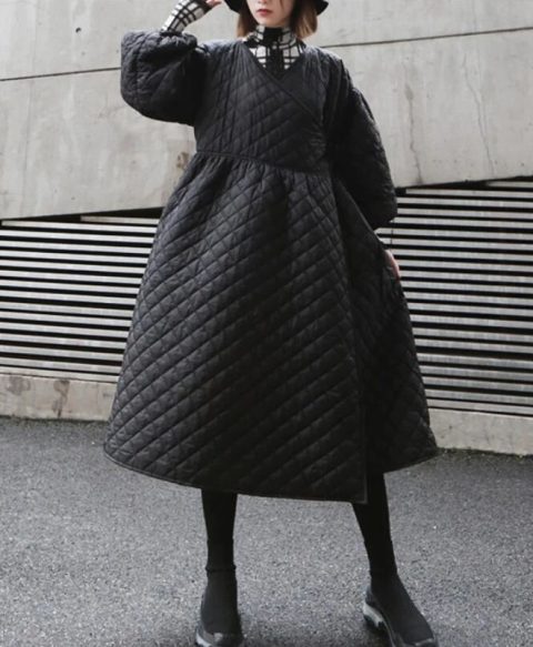 With black hat, black platform sneakers and checked dress
