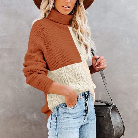 With brown wide brim hat, gray leather bag and light blue jeans