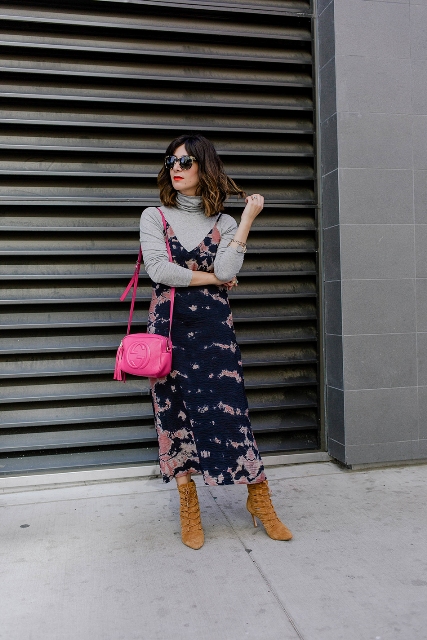 With hot pink tassel bag, brown suede lace up ankle boots and sunglasses