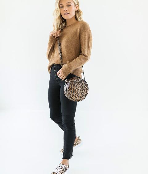 With light brown sweater, black cropped jeans and leopard printed lace up flat shoes