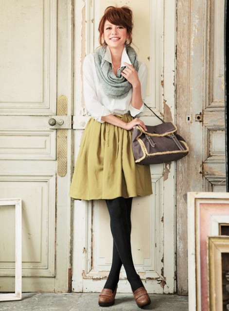 With white button down shirt, bag, mustard yellow mini skirt, black tights and brown leather platform shoes