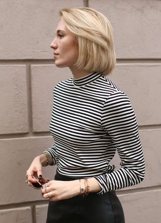 a classic short bob in creamy blonde is a perfect solution - you get an always-on-trend haircut and a super edgy hair color
