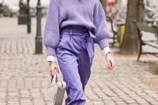a periwinkle look with a chunky knit sweater, high waisted trousers, white boots and a white bag for spring
