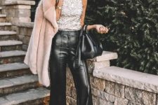 a silver sequin sleeveless top, black leather trousers and a neutral faux fur jacket for the holidays