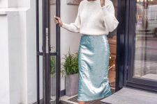 a white jumper, a seafoam sequin midi skirt and white trainers for a lovely and comfy holiday look