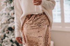 a white oversized jumper, a rose gold sequin midi pencil skirt and statement earrings for the holidays