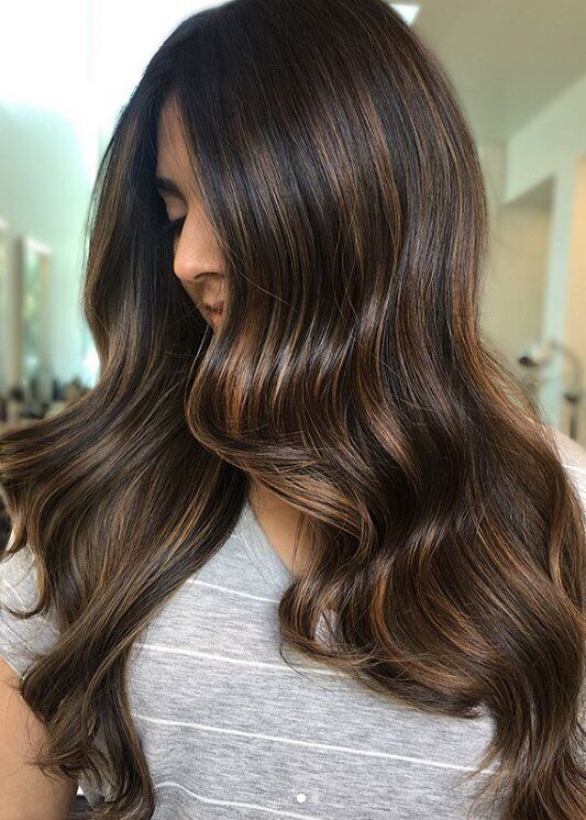beautiful long cold brew hair with caramel balayage and honey touches looks dimensional and veyr eye-catchy