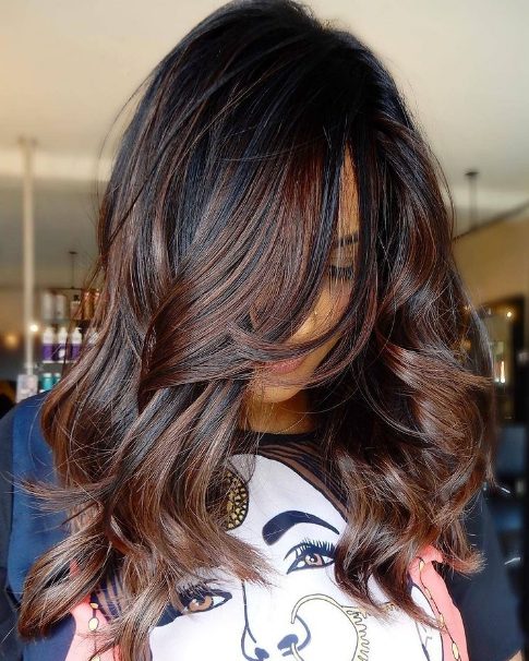 beautiful medium-length cold-brew hair with copper chestnut balayge starting in the middle looks multi-dimensional and very bold
