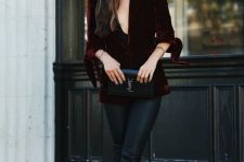 black leather skinnies, a burgundy velvet blazer with tied up sleeves, a black clutch and black shoes for Christmas