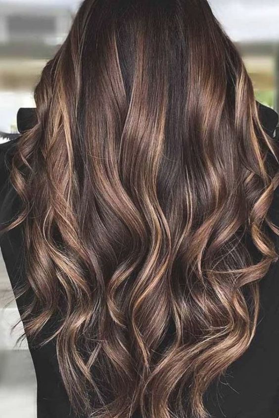 long and wavy cold brew hair with chestnut, light brunette and honey balayage starting in the middle looks gorgeous