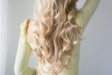 super long curly creamy blonde hair is classics that is all about femininity and delicate and girlish looks