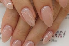 02 nude nails with touches of matching nude glitter are amazing for any time and any season, they match most of looks