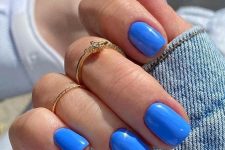 16 bright blue nails like these ones are perfect for summer, they will make you look bold and fun