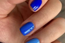 30 a colorful manicure done in different shades of blue is a great way to show off two trends in one