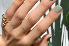 31 a multi-color manicure done in the shades of green and yellow is amazing for summer
