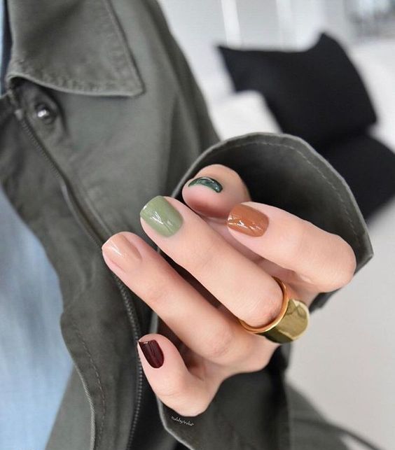 beautiful multi-colored nails in fall shades will be a gorgeous idea for those who love natural and jewel tones