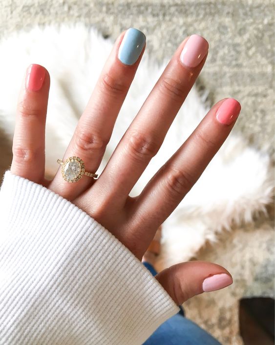 a lovely pastel multi-colored manicure is a gorgeous solutin for a spring or summer look