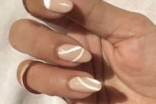 37 tan and white abstract pattern nails are amazing to make your look super trendy this year