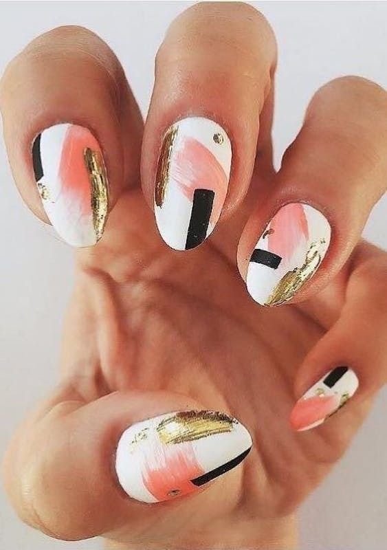 a super bold nail art, with pink and gold brushstrokes and black lines are a gorgeous trendy solution