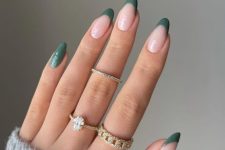 45 a French manicure with green tips and a green accent nail is a lovely idea for fall