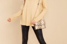 With beige wide brim hat, printed chain strap bag, black leggings and black velvet low heeled boots