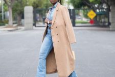 With denim button down shirt, flare jeans, high heels, beige midi coat and sunglasses