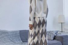 With gray, brown and white printed midi skirt and black suede mid calf boots